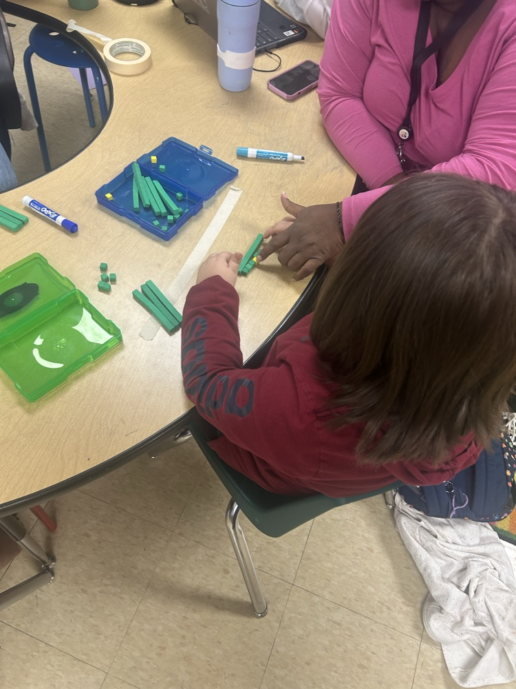 Subtracting with base ten blocks