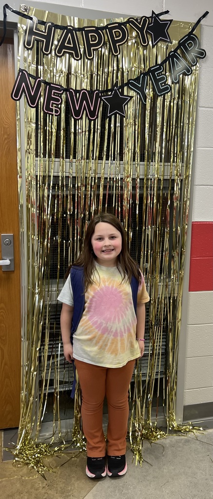 CWE student poses for New Years celebration