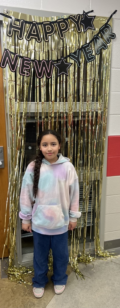 CWE student poses for New Years celebration