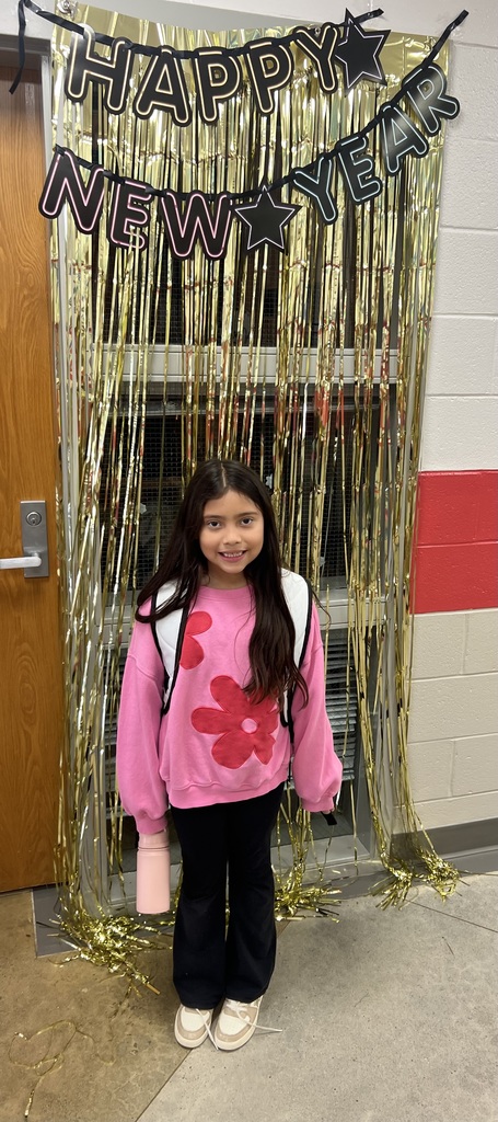 CWE student poses for New Years celebration