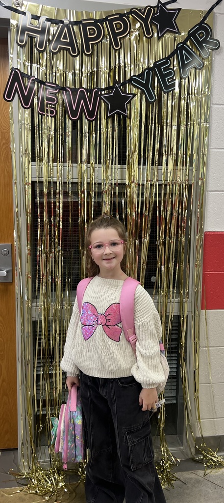 CWE student poses for New Years celebration