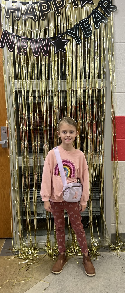 CWE student poses for New Years celebration