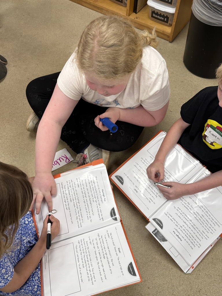 First graders reading with K5 buddies