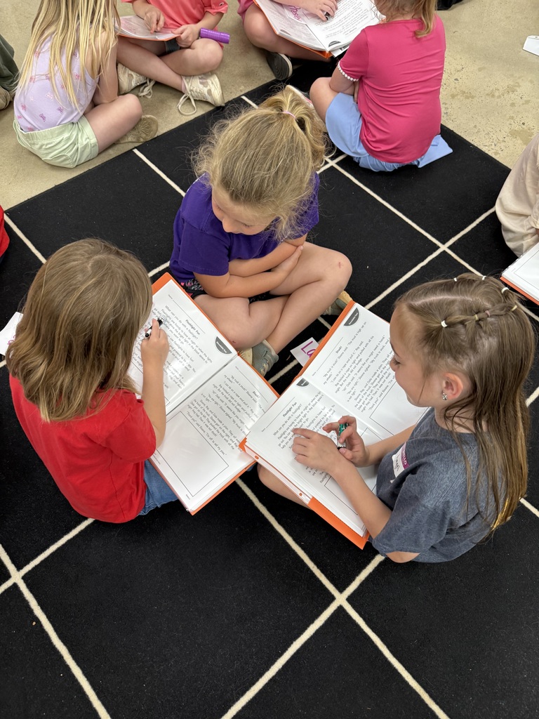 First graders reading with K5 buddies