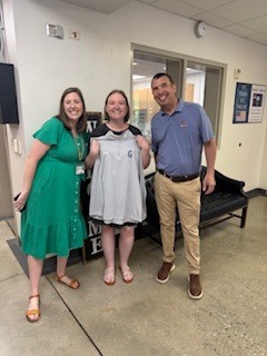 Katie Britton, Alicia Childers, and Tim Johnson,  Alicia is holding G2i Quarterzip