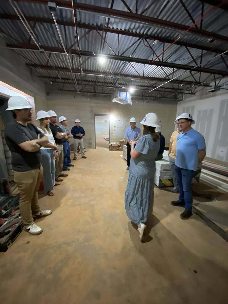 G2i Assistant Director, speaking to local pasters in G2i.