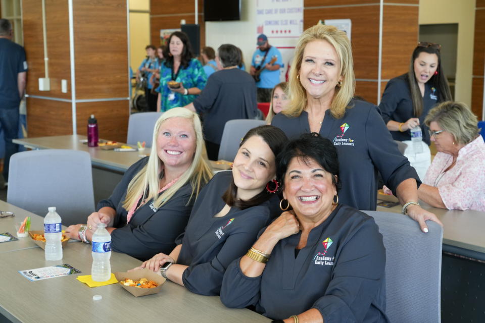 Grand Opening of SDPC Academy for Early Learners: AEL teachers posing together and smiling