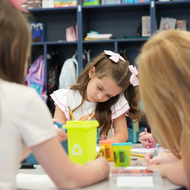 student working in classroom