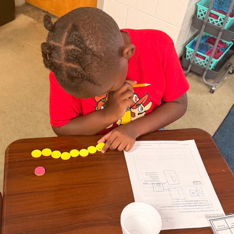 first graders working on math
