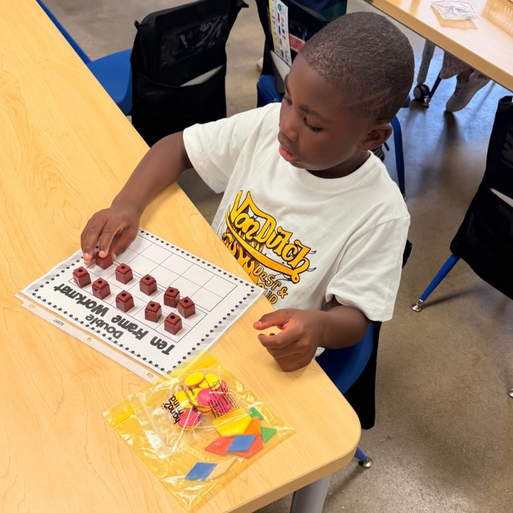 student working with math
