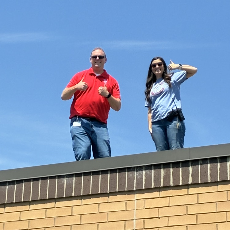 Mr. Shipman and Mrs. Windham assist from the roof