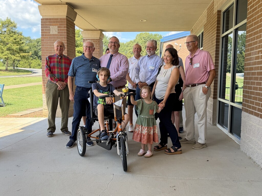 Rotary with Mr. Thompson, Mrs. Turner and students with the new adaptive bike