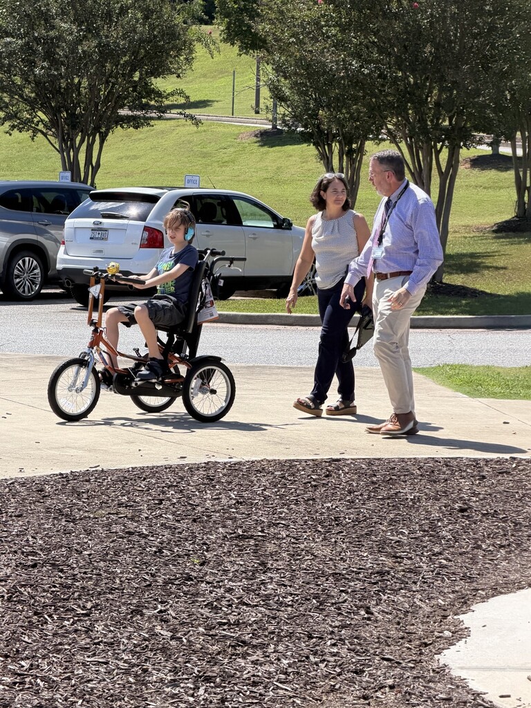 Student testing out the new adaptive bike
