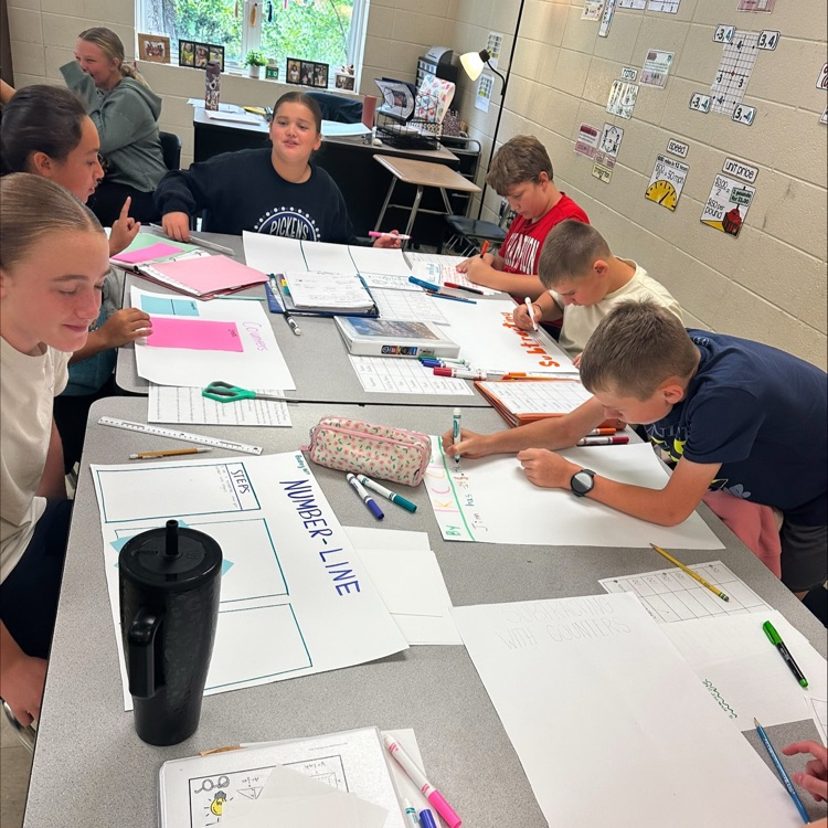 picture of 6th grade math students working on subtracting projects
