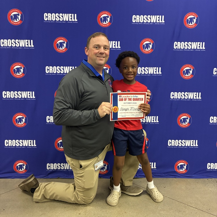 Mr. Shipman poses with a student