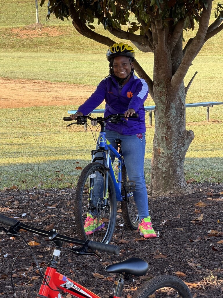 Fourth grade student on a bike