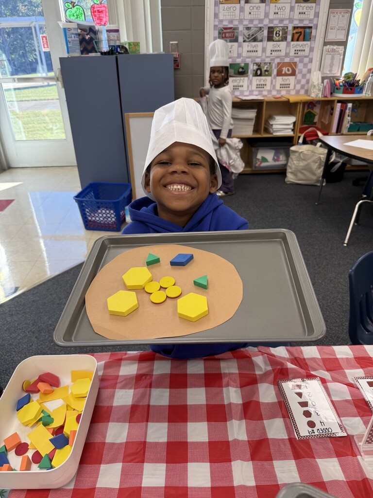 Student sharing his shape pizza.