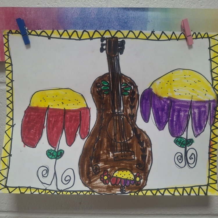 student art work display inspired by Hispanic artists.