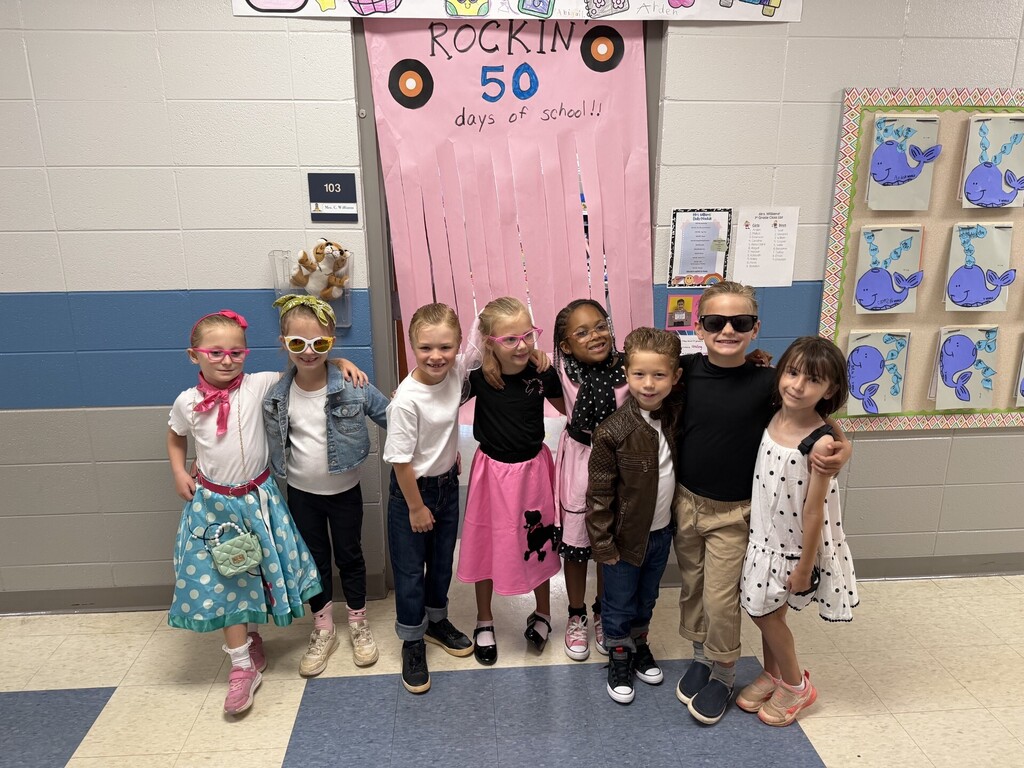 First Grade students dressed in 1950s attire.