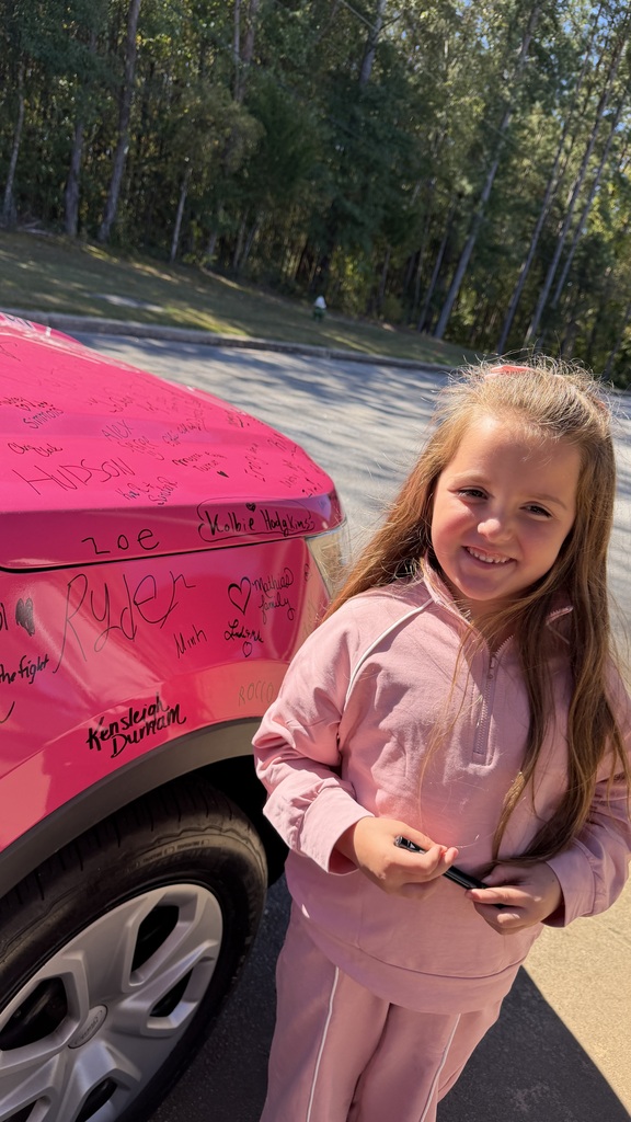 students signs the car