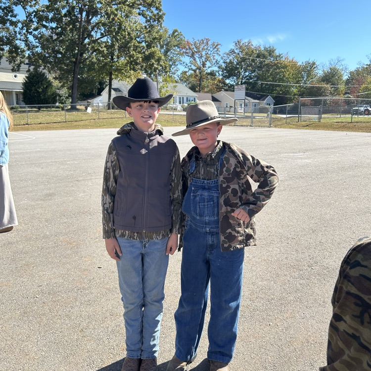 two fourth grade cowboys at recess during red ribbon week