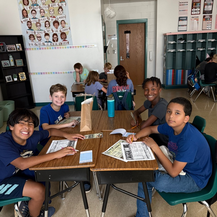 all smiles while solving the word problem for the dirty soda cafe