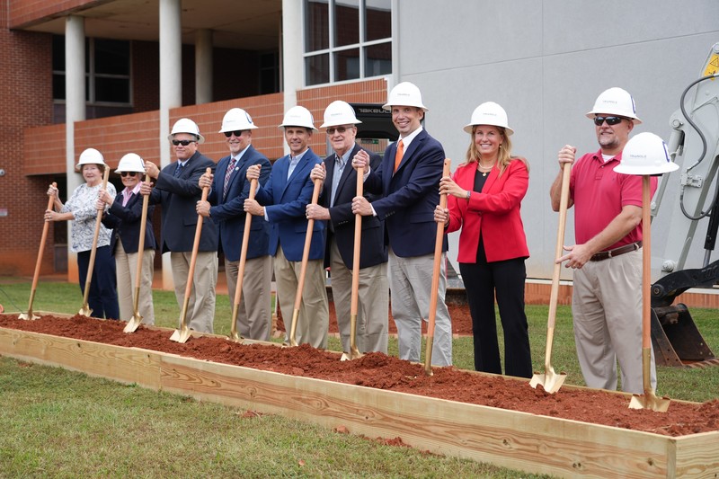 SDPC board members, Superintendent Dr. Merck, and Dr. Mendel Stewart were the first to break ground at G2i