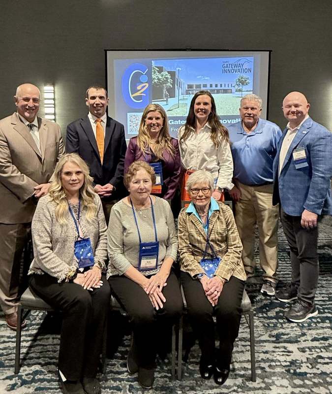 School Board Members, Tim Johnson, Danny Merck and representatives from Goodwyn Mills Caywood