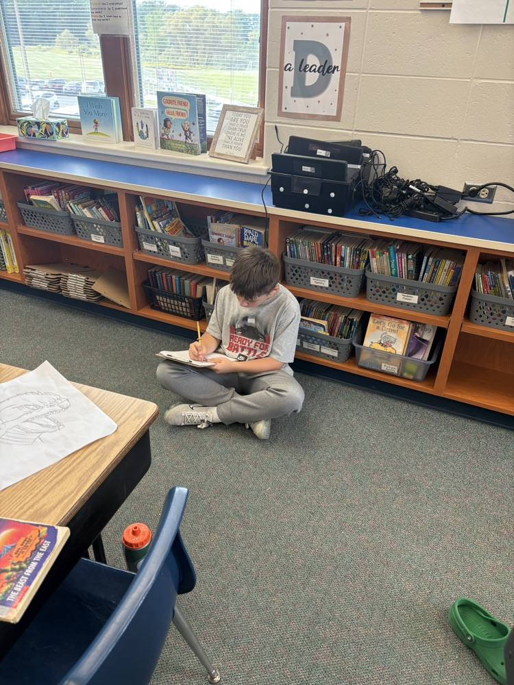 student working on writing 