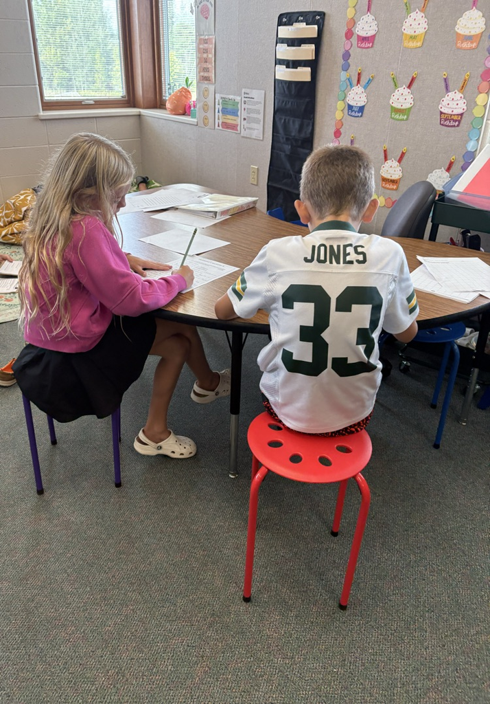 students working on writing 