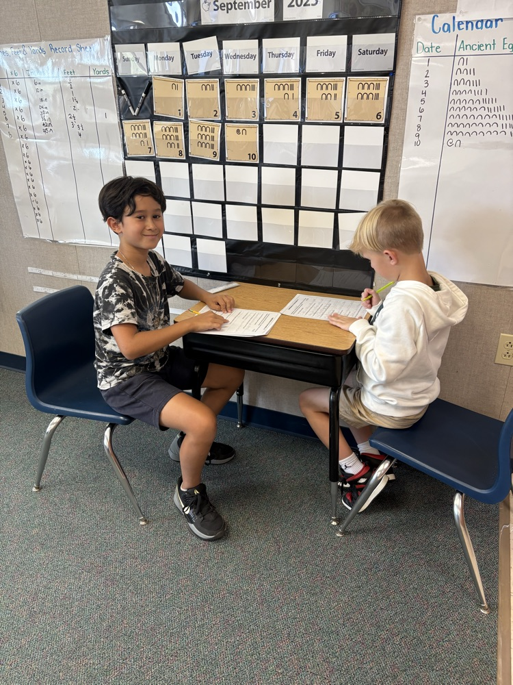 students working on writing 