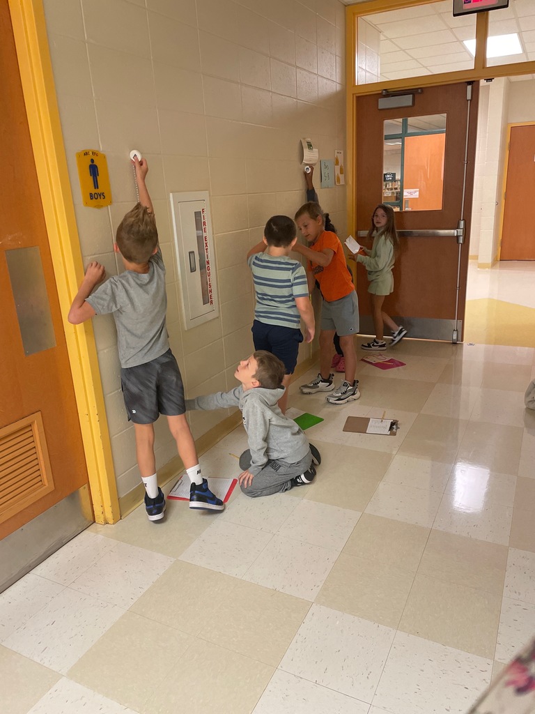 6 students measuring tiles