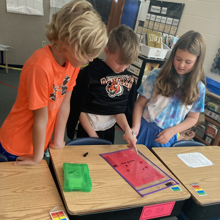 students playing a math game