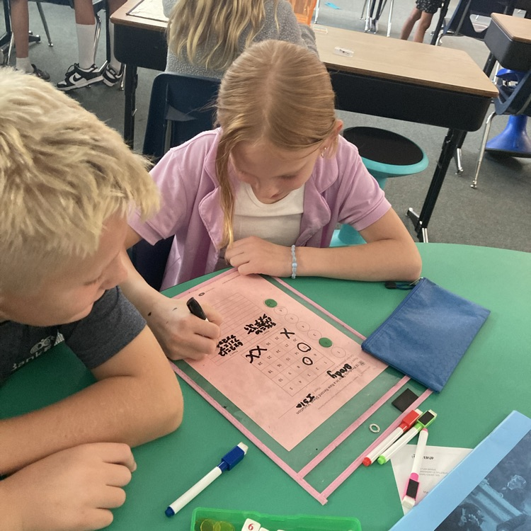 students playing a math game