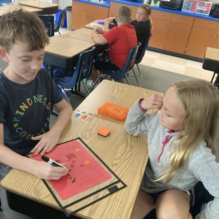 students playing a math game