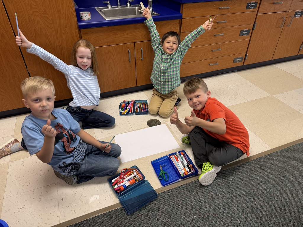 students excited to work together on a picture