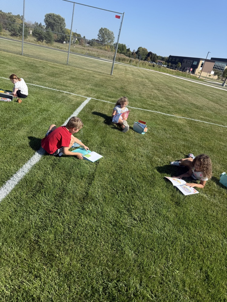 First grade took some time to soak up words and sun rays! Reading in the sun!