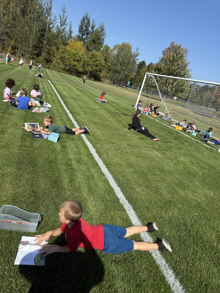 First grade took some time to soak up words and sun rays! Reading in the sun!