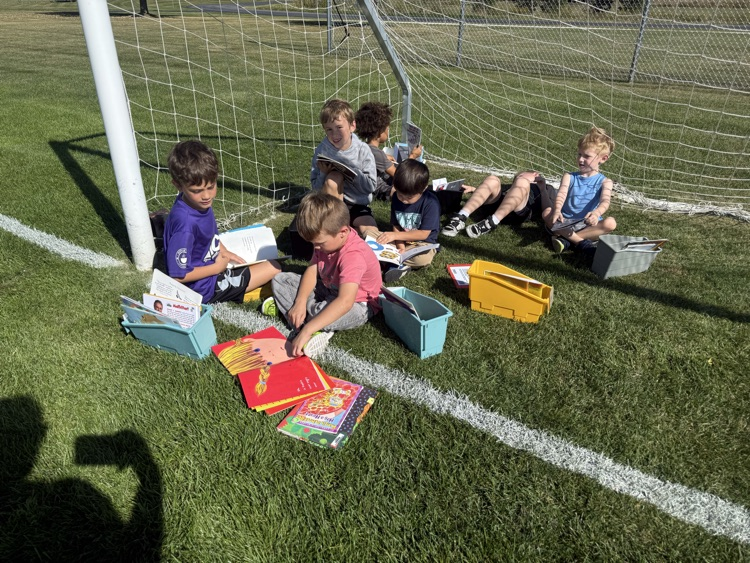 First grade took some time to soak up words and sun rays! Reading in the sun!