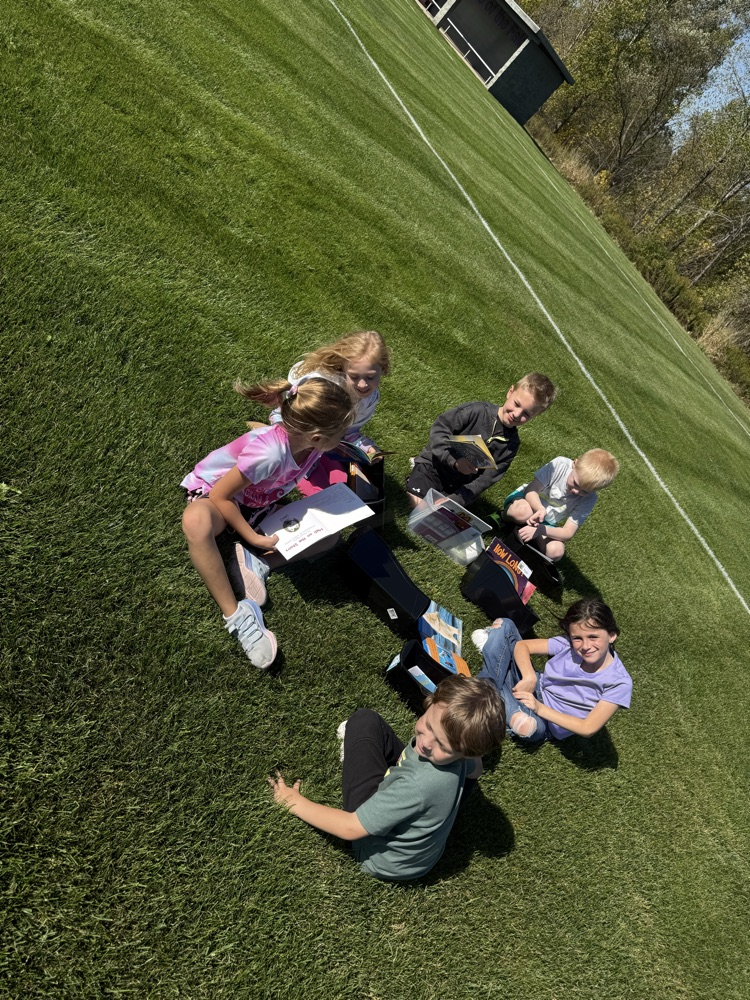 First grade took some time to soak up words and sun rays! Reading in the sun!