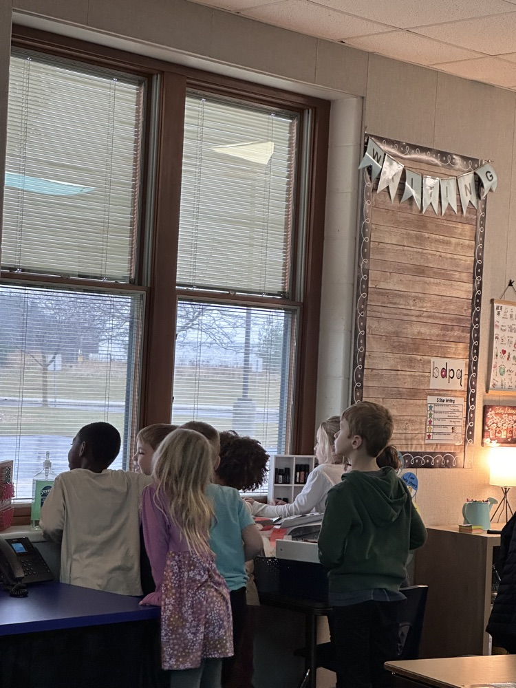 students looking out the window. 
