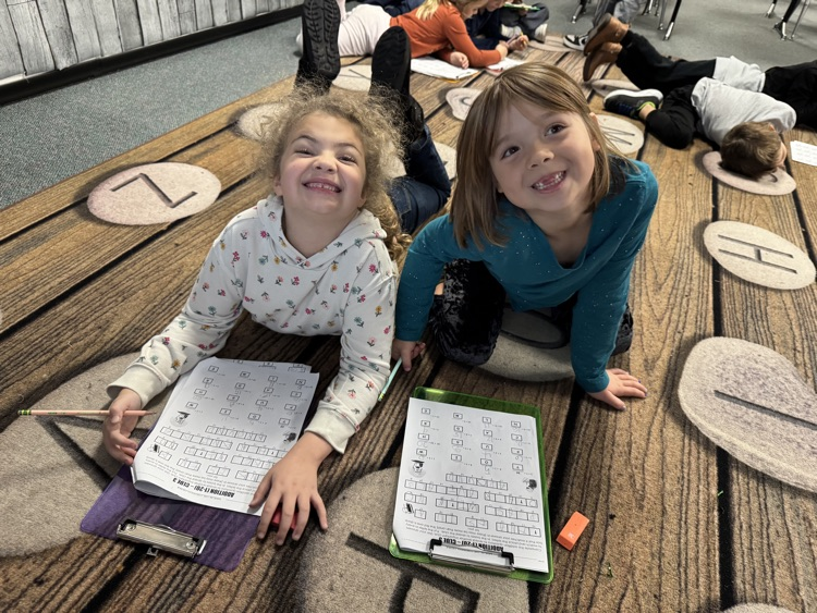 students solving math problems together 