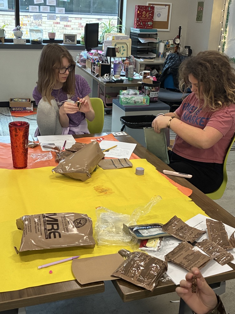 Students enjoying MRE's