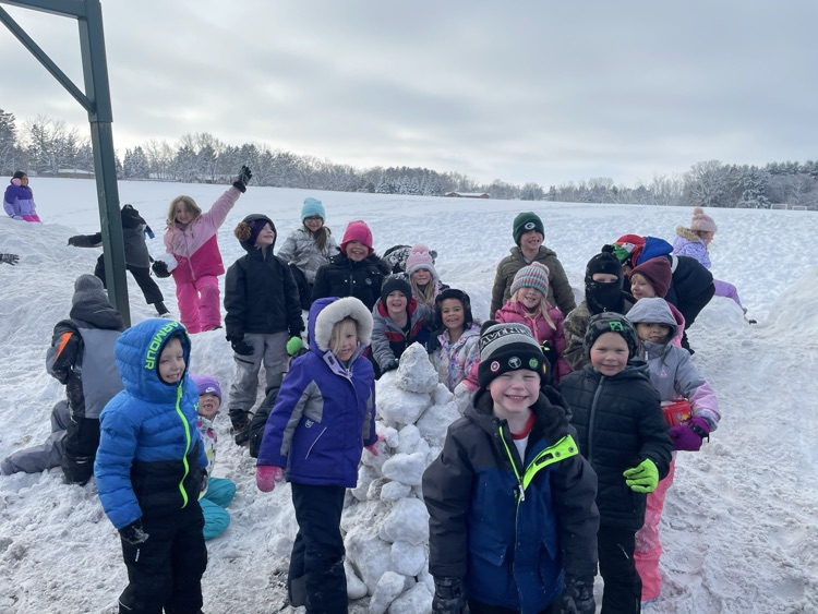 1st graders showing off their snow mountain.