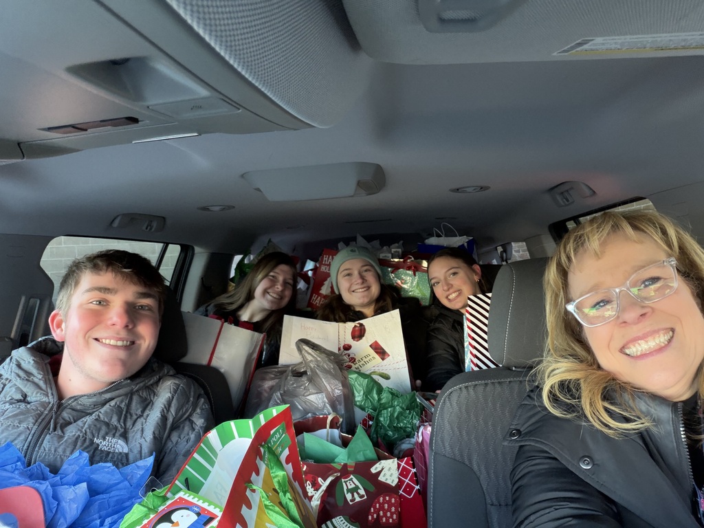 It's really a challenge to fit all of the gifts in the suburban...but we did it!!!