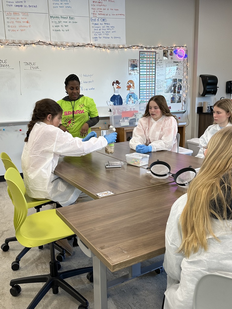 Images show students conducting experiments that show them how Biological Therapies are created. 
