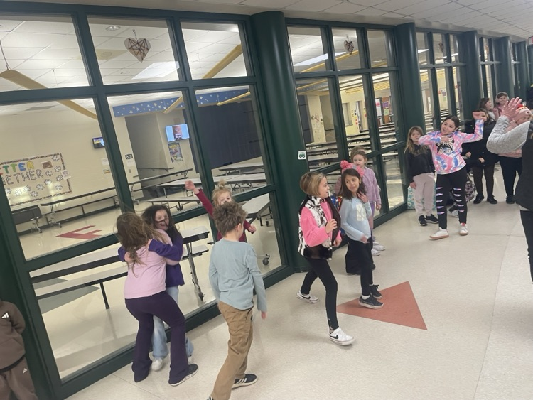 Children dancing in the hallway