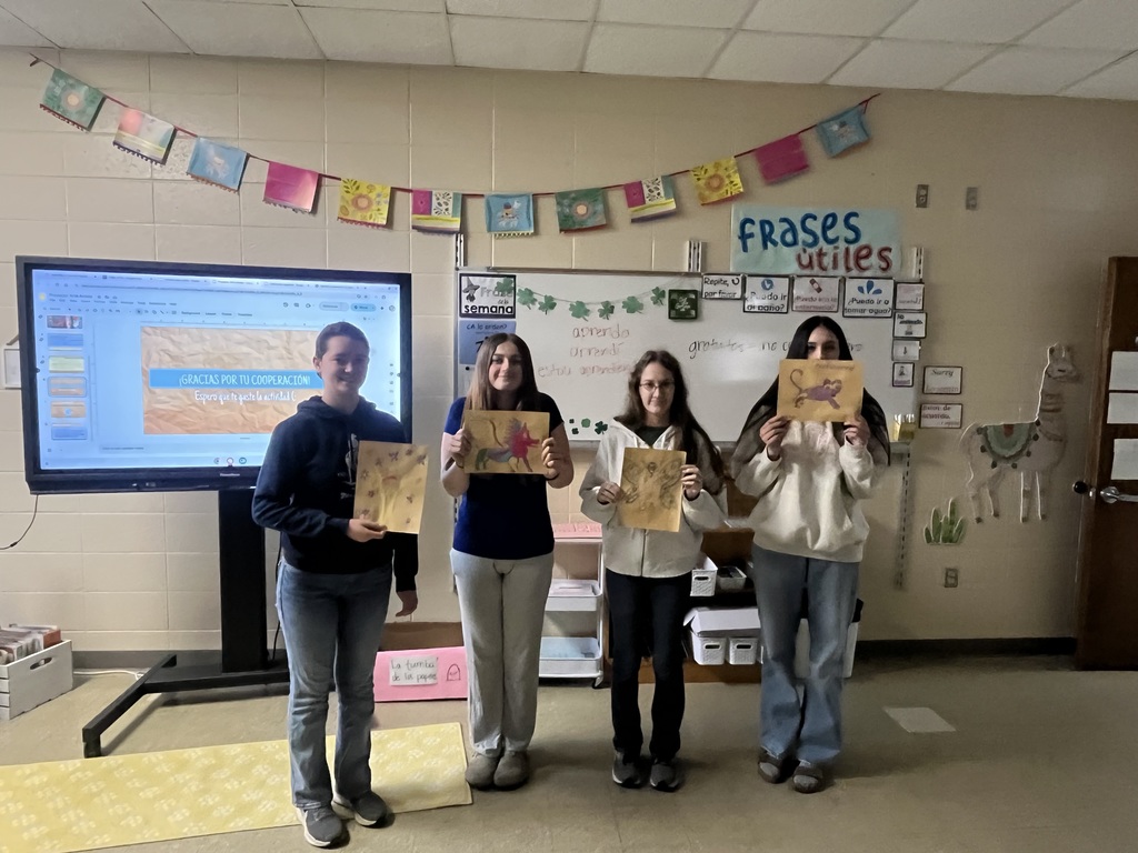 Spanish II Students with Art Work