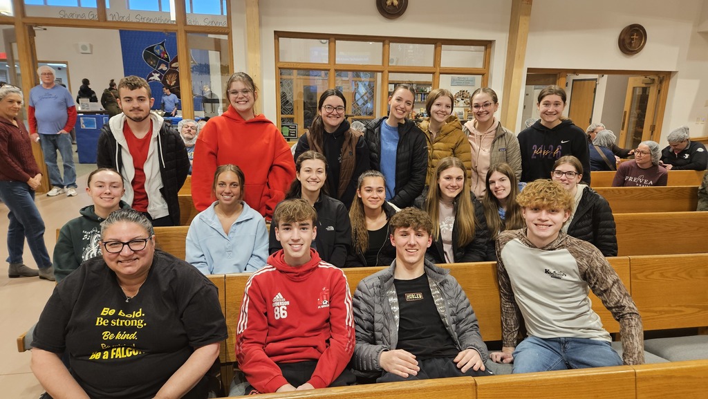 Sheboygan Falls High School National  Honors Students volunteer at the "Feed My Starving Children" event.