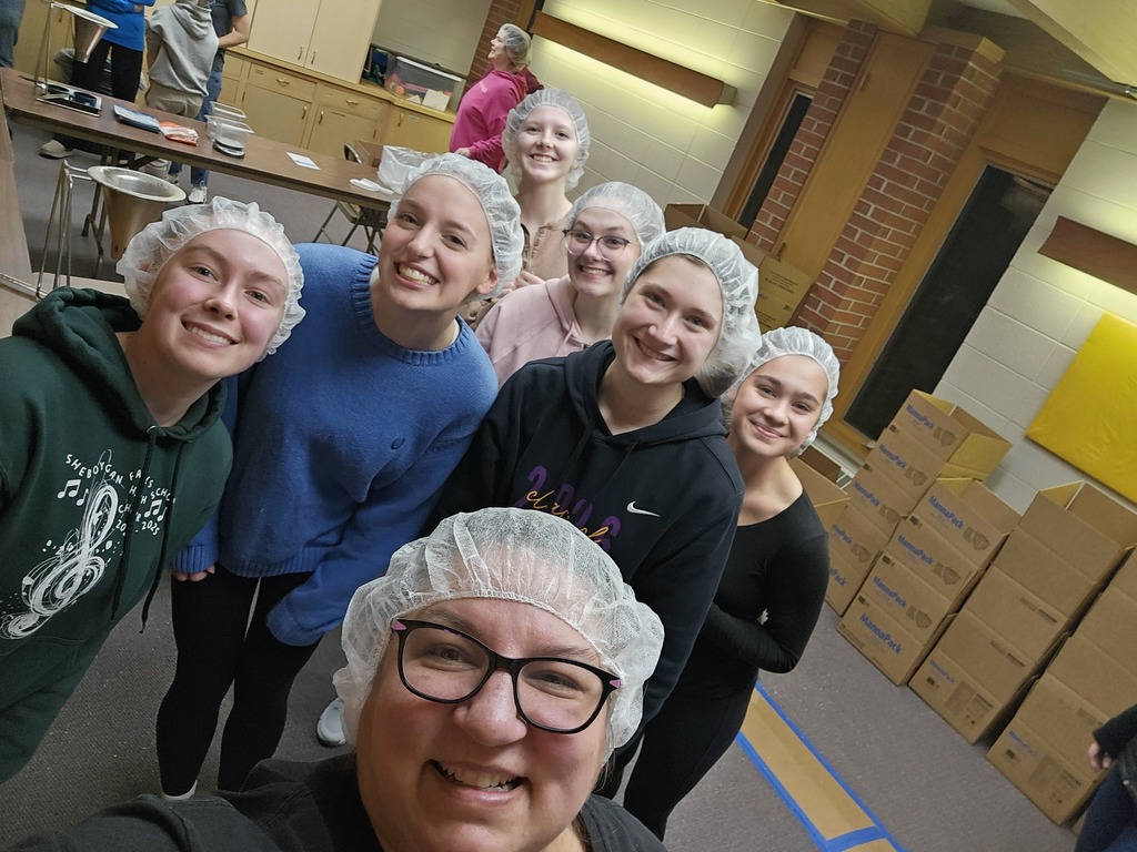 Sheboygan Falls High School National  Honors Students volunteer at the "Feed My Starving Children" event.